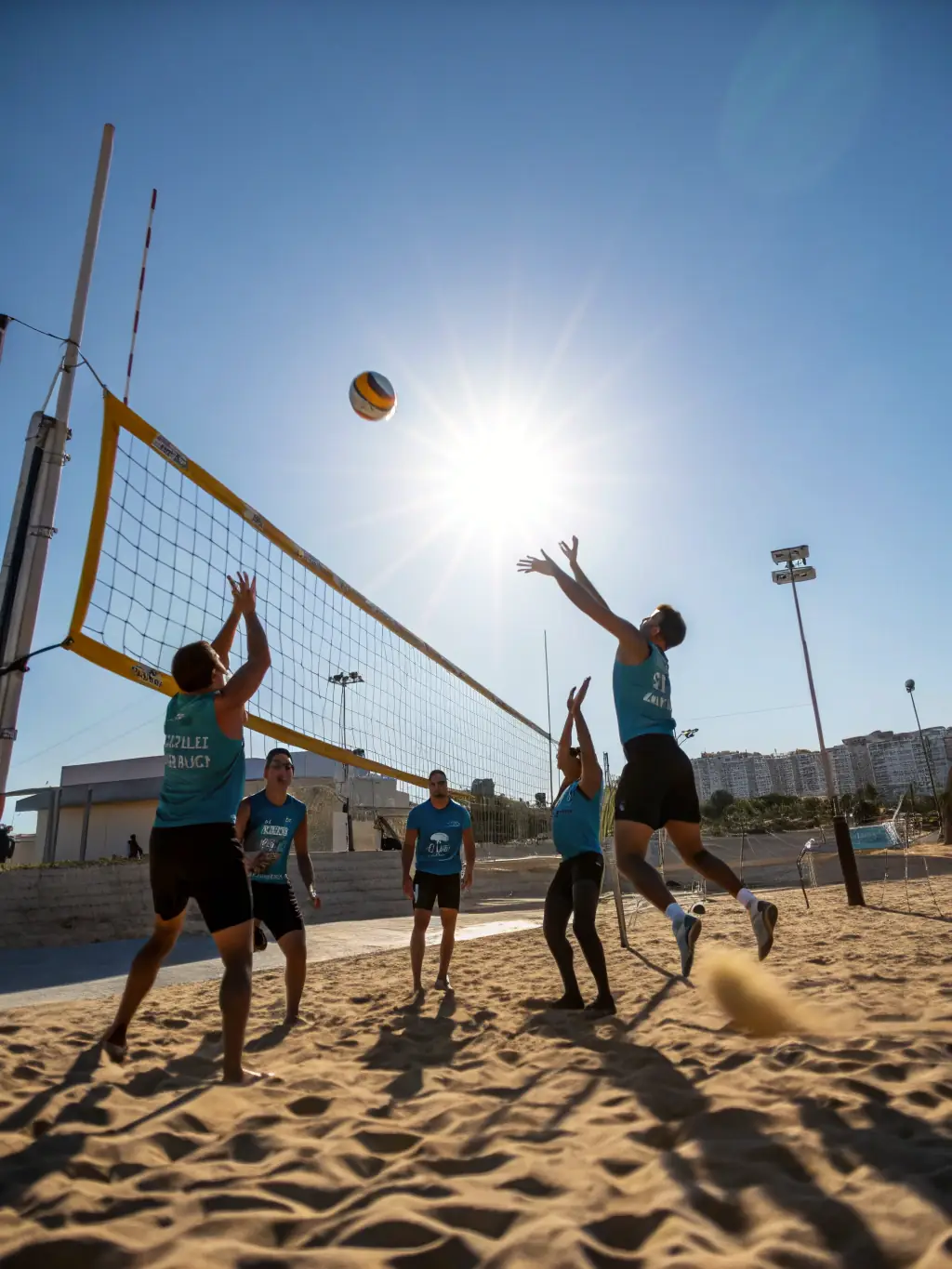 A group of Sciences Po Nancy students laughing and playing volleyball on a sunny day, showcasing the association's role in promoting physical activity and enjoyment.